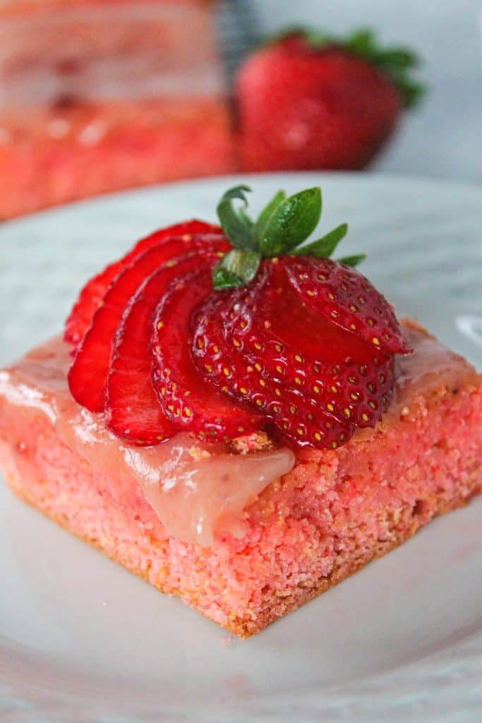 strawberry brownie topped with fresh strawberries