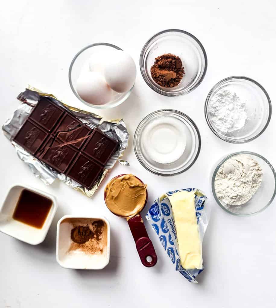 overhead shot of all ingredients needed to make mini chocolate peanut butter cakes