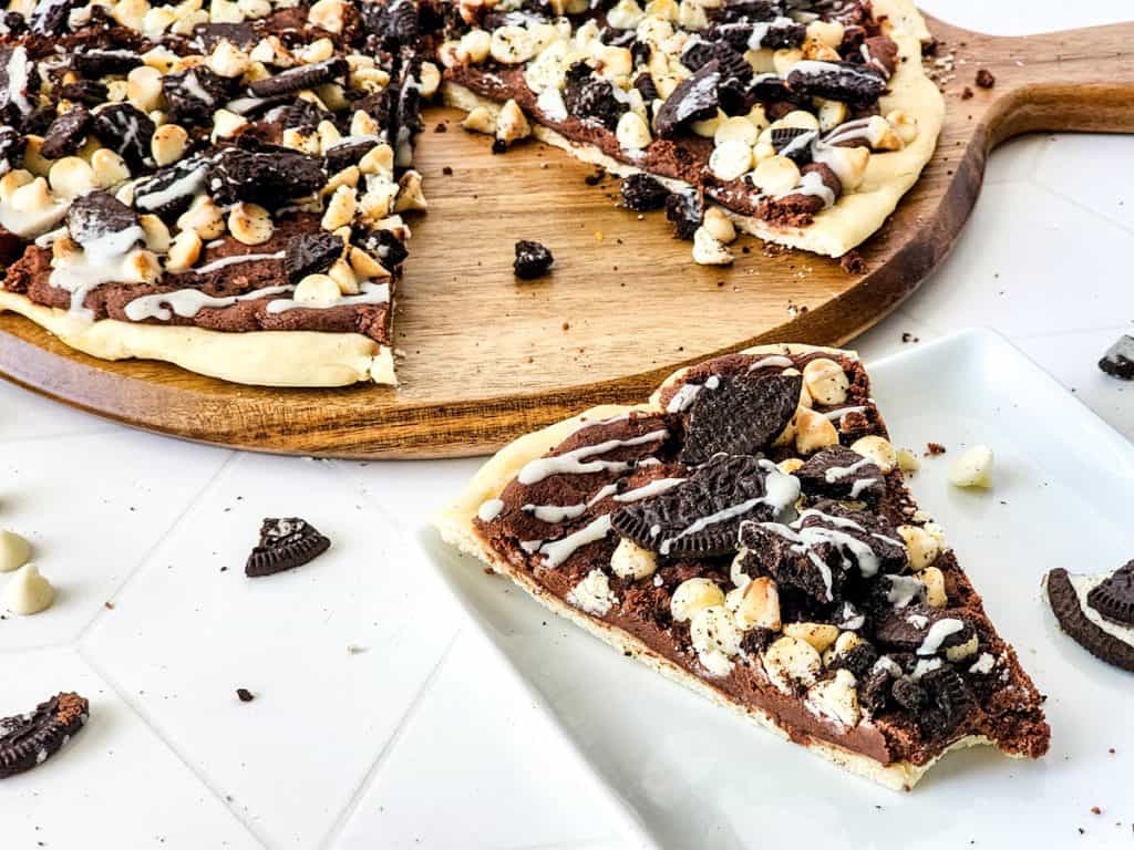 cookies and cream pizza cut into slices