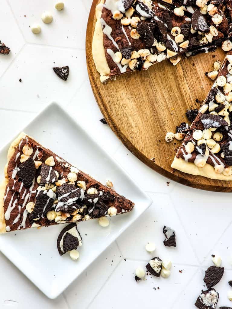 finished cookies and cream pizza slice on a plate