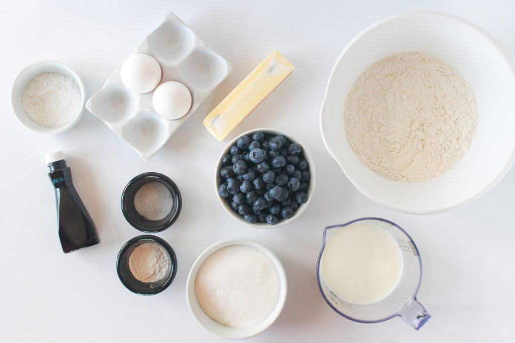 overhead shot of all ingredients needed to make jumbo blueberry muffin recipe