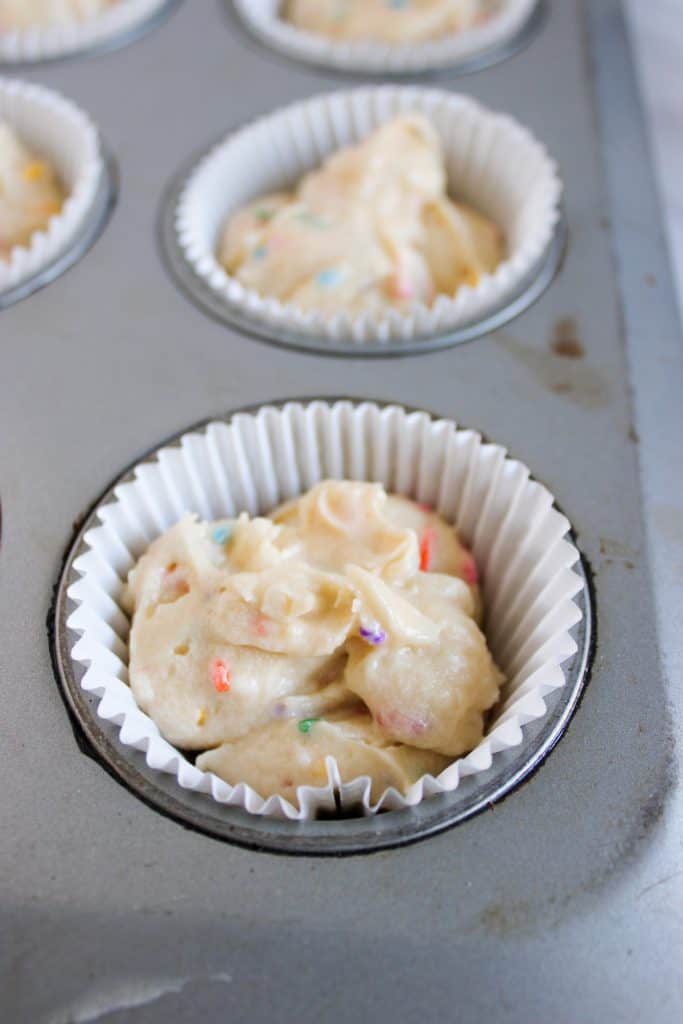 batter added to lined cupcake tin