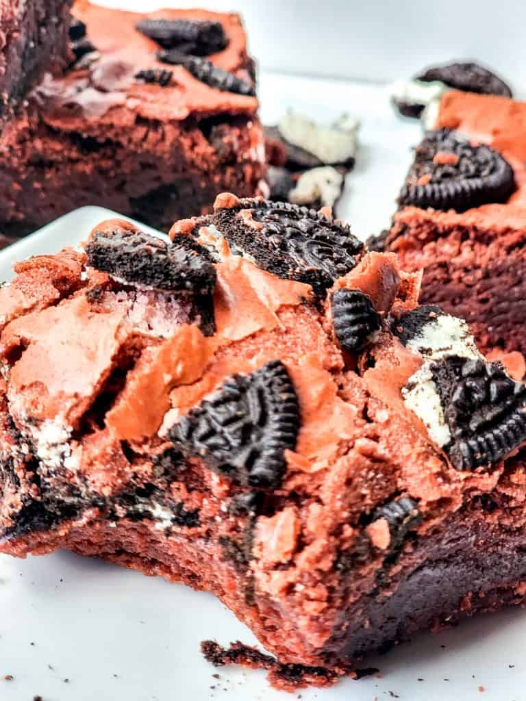 closeup of oreo red velvet brownie on plate