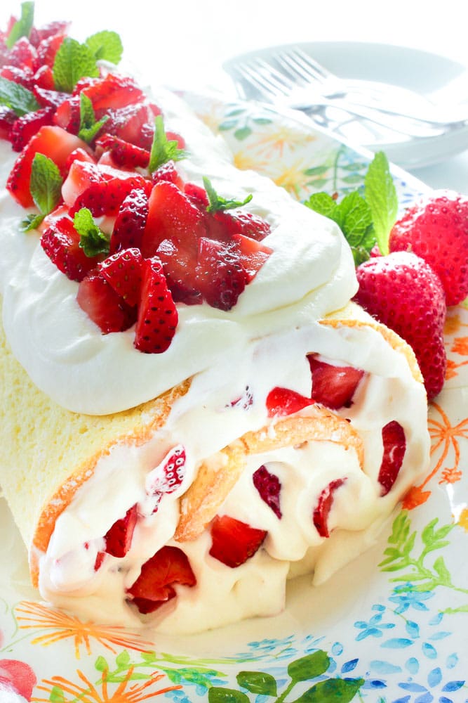 Easy Strawberry Cake Roll is perfect for spring or summer Mothers Day brunch or a bbq Simple but elegant