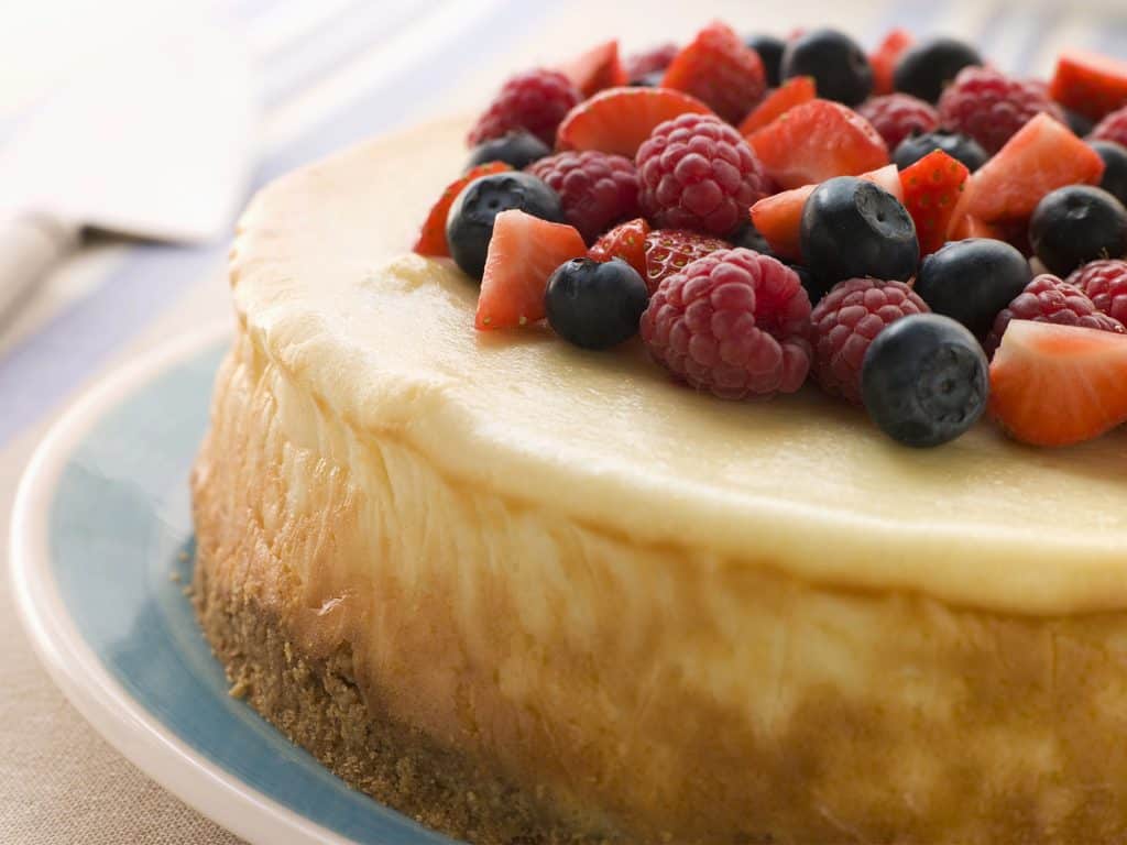 summer dessert recipes - cheesecake with berries on top