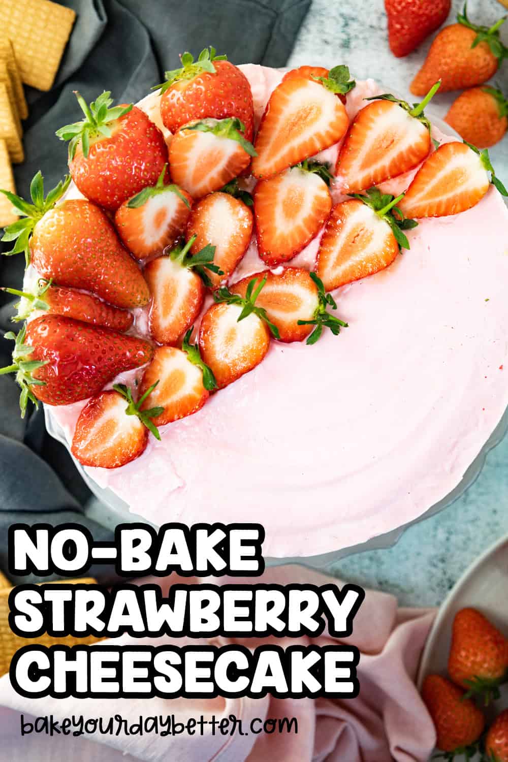 picture of cheesecake with text overlay that says: no bake strawberry cheesecake
