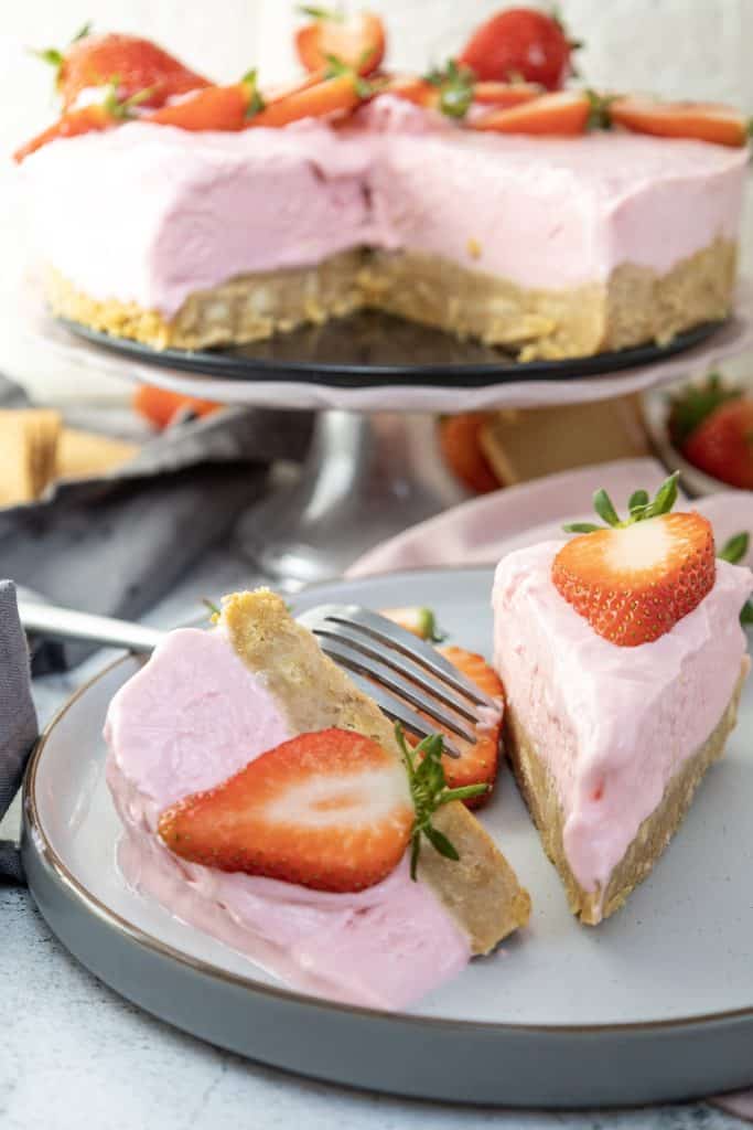 slices of strawberry cheesecake on a plate