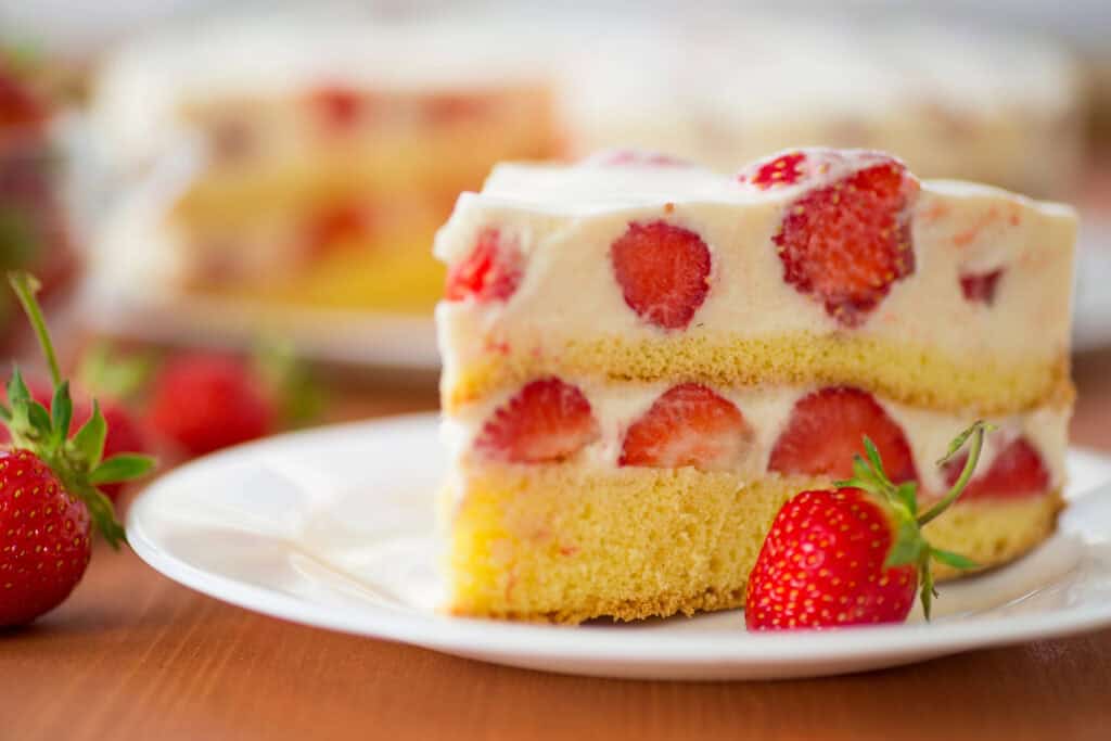 best strawberry recipes - strawberry layer cake on a plate