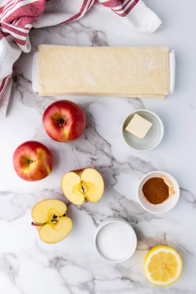 overhead shot of ingredients for puff pastry apple tart roses