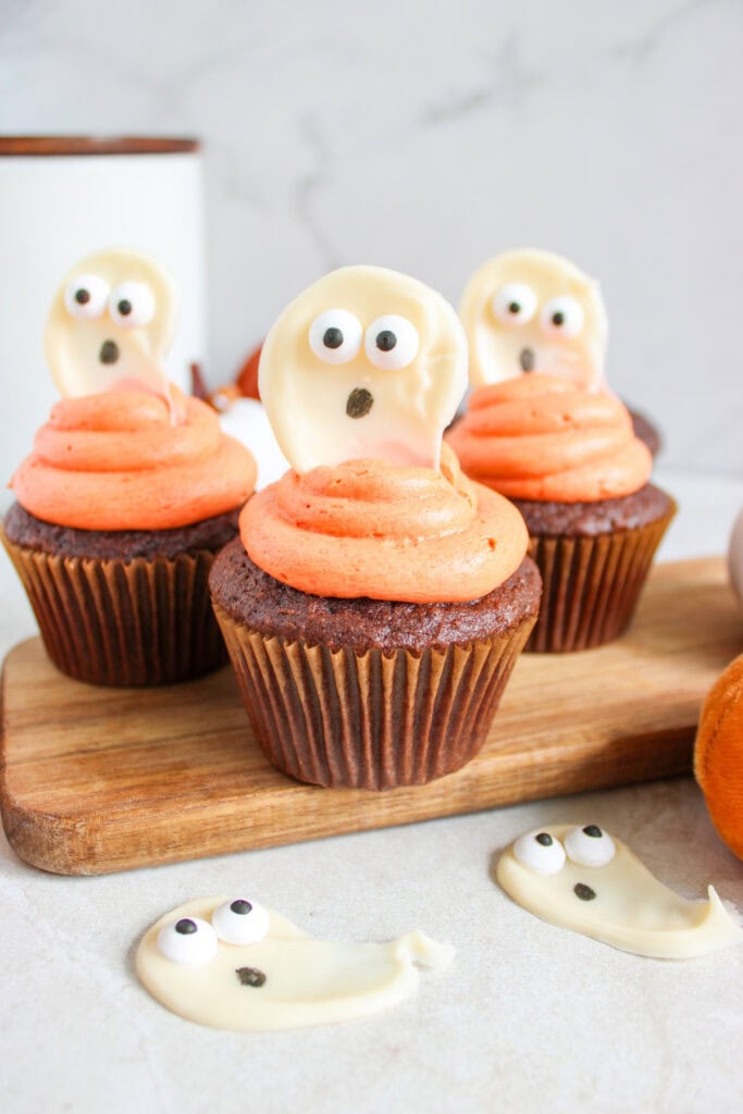 closeup of halloween cupcakes with ghosts