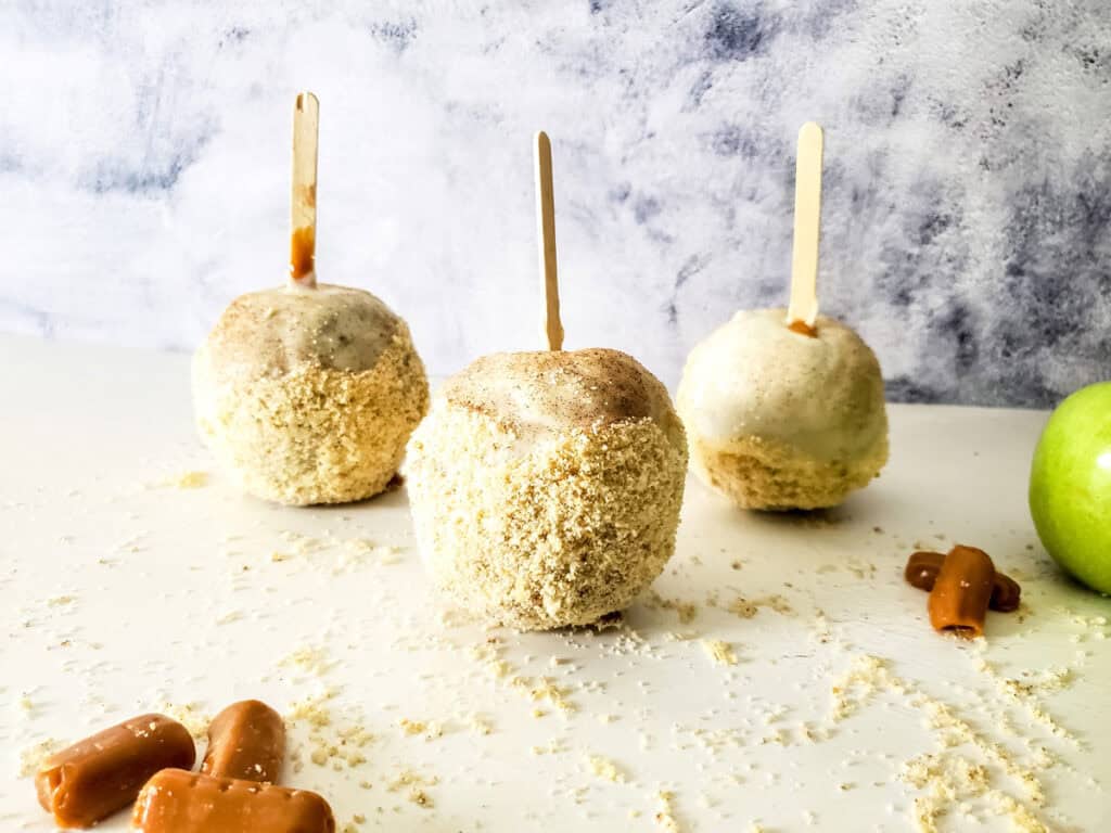 apple pie caramel apples on a counter
