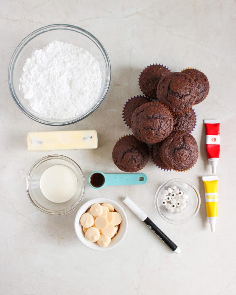 overhead shot of ingredients for halloween ghost cupcakes