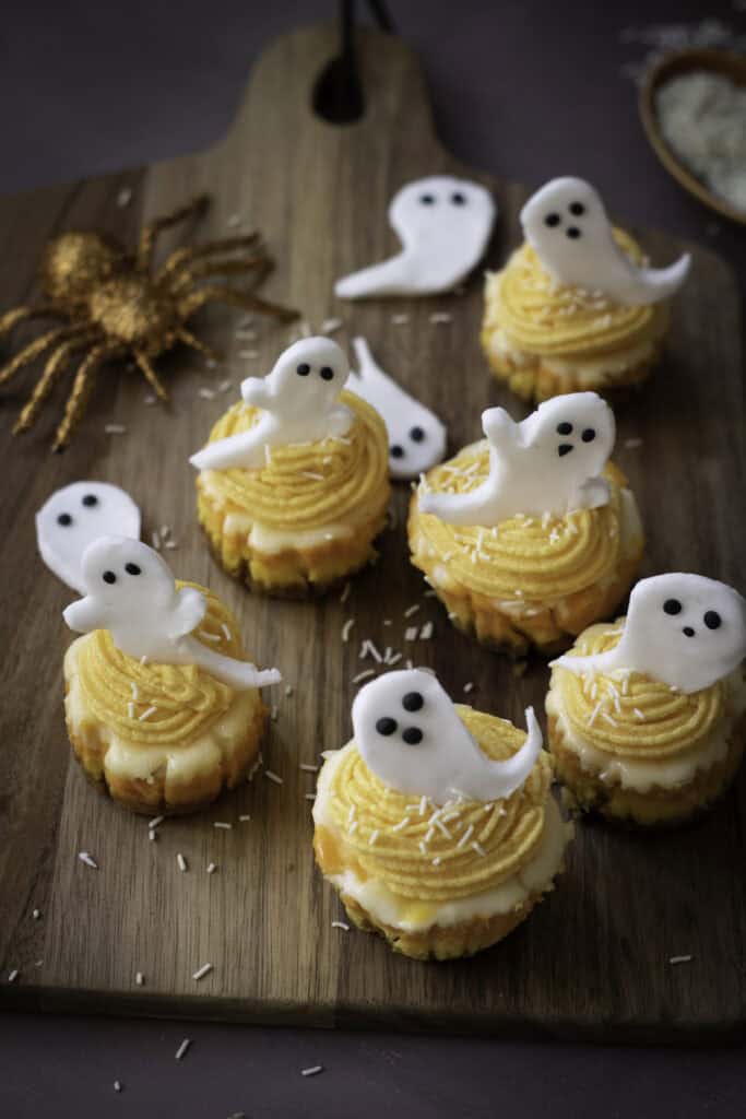 overhead shot of mini cheesecakes on a counter