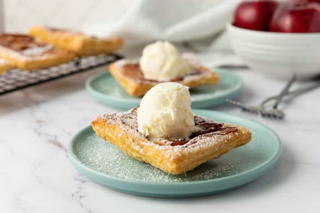 upside down apple tart puff pastry on a plate