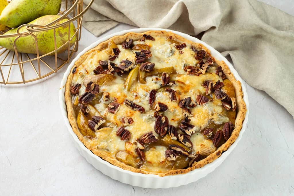 pear and pecan tart on counter