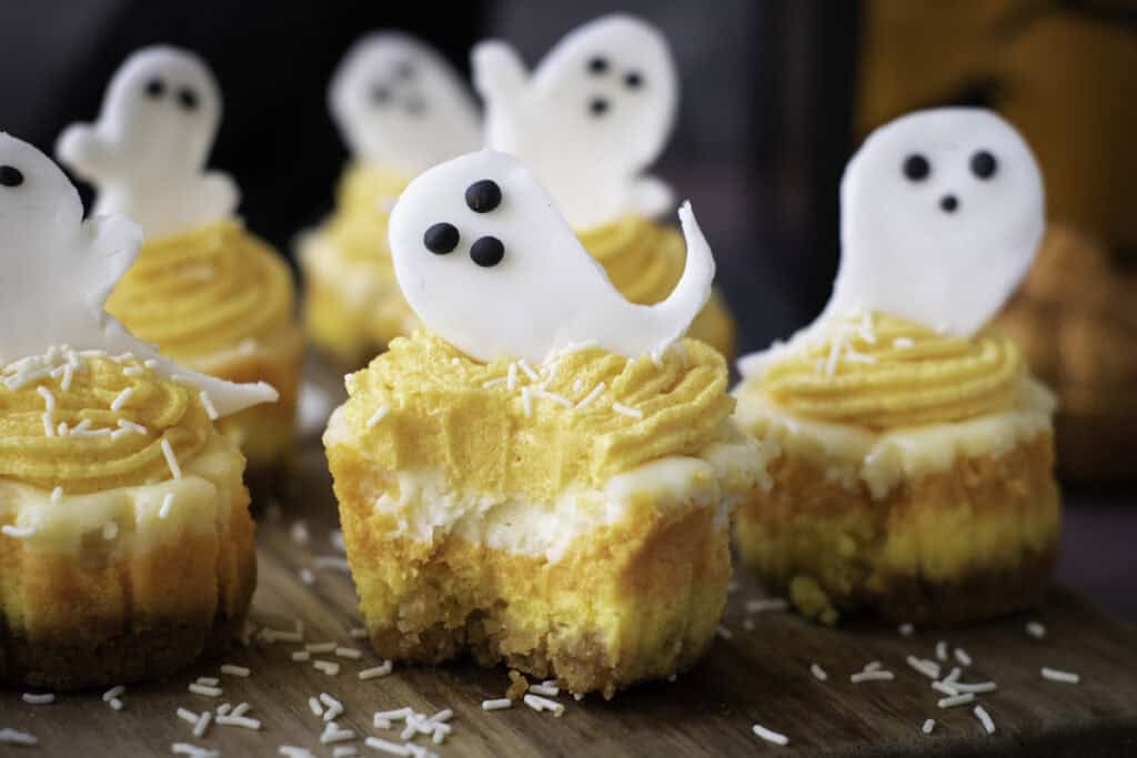 mini candy corn cheesecakes with fondant ghosts