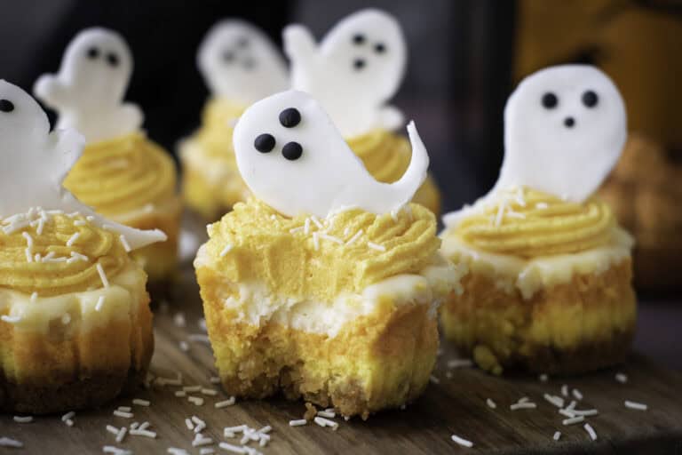 individual candy corn cheesecakes with fondant ghosts