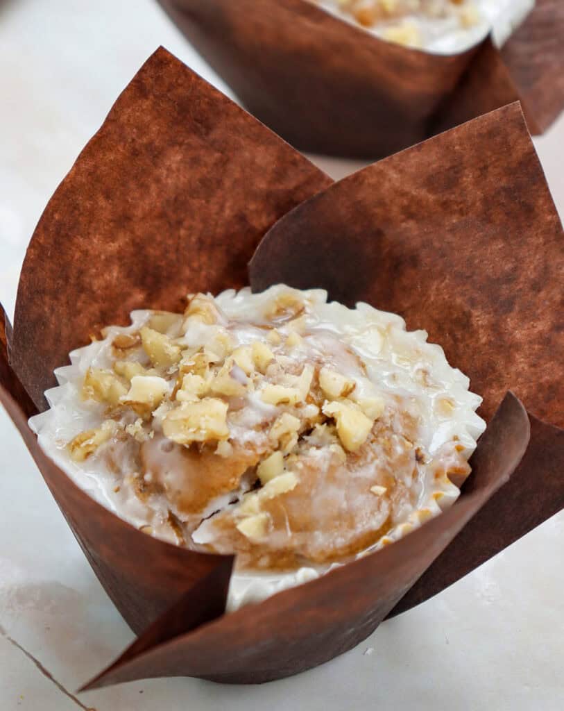 closeup of pumpkin muffin in parchment paper