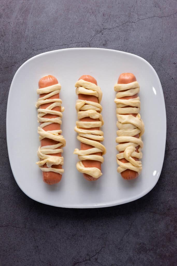 hot dogs wrapped in crescent roll strips