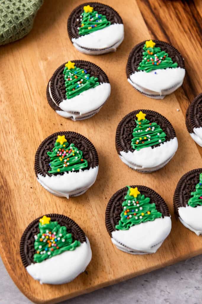 closeup of christmas tree oreos on a cutting board