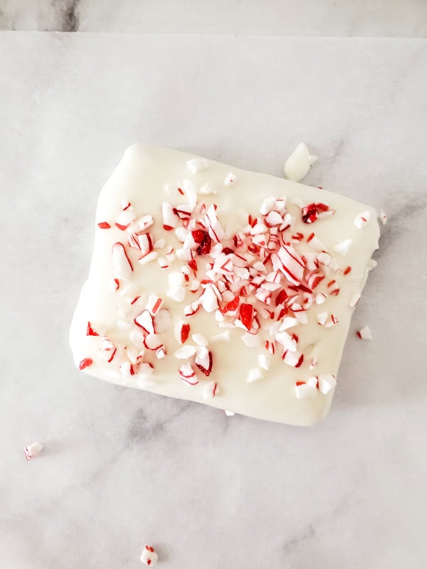 crushed peppermint added to top of cracker