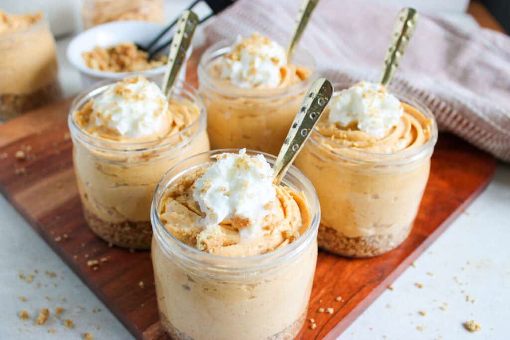 finished pumpkin cheesecakes in jars