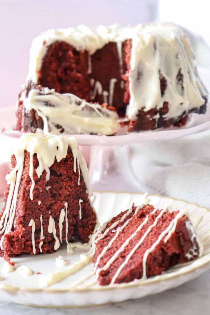 red velvet bundt cake with drizzled frosting on top