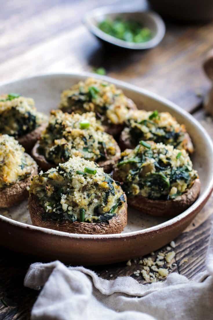 Vegan Stuffed Mushrooms on a Brown Plate