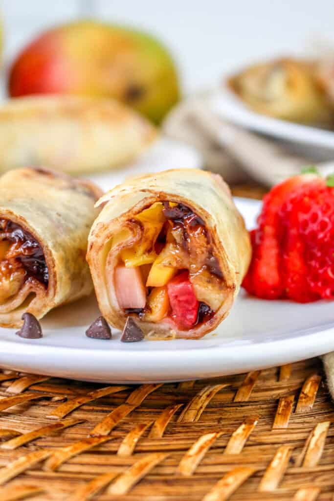 closeup of finished spring rolls on a plate