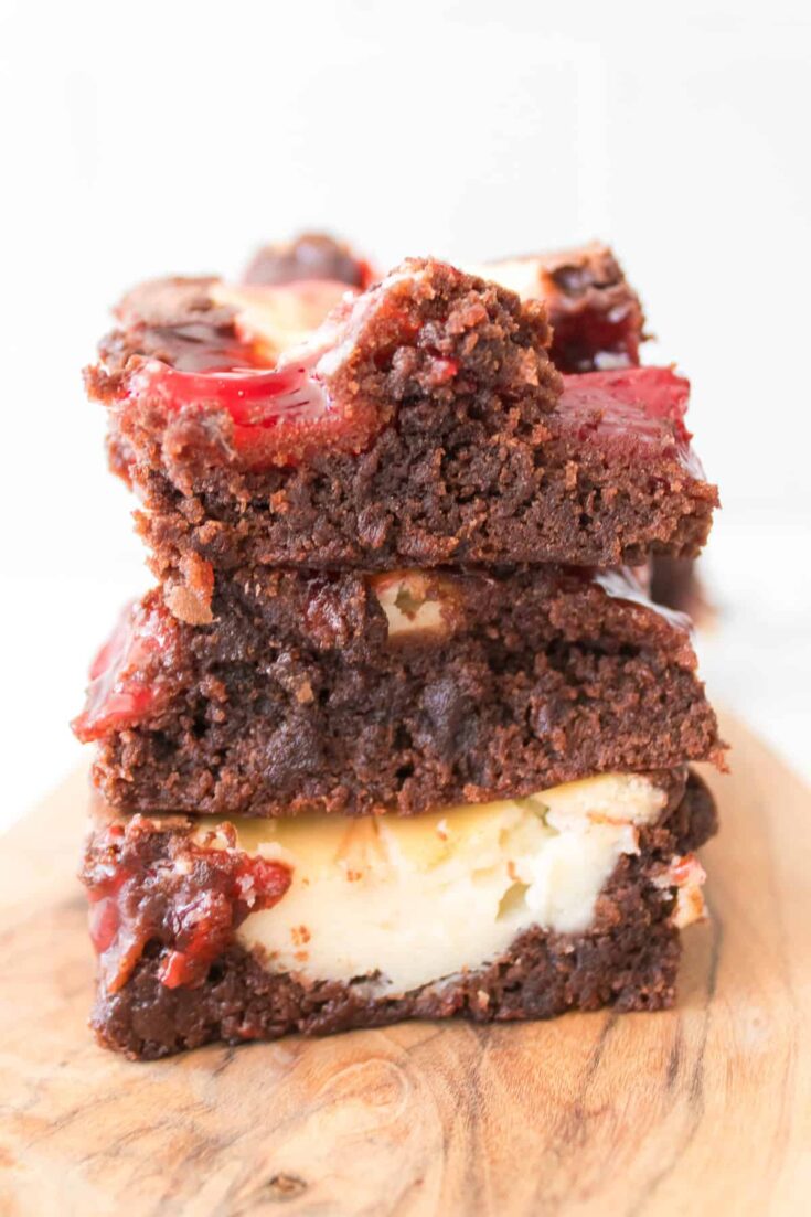 stack of strawberry cheesecake brownies