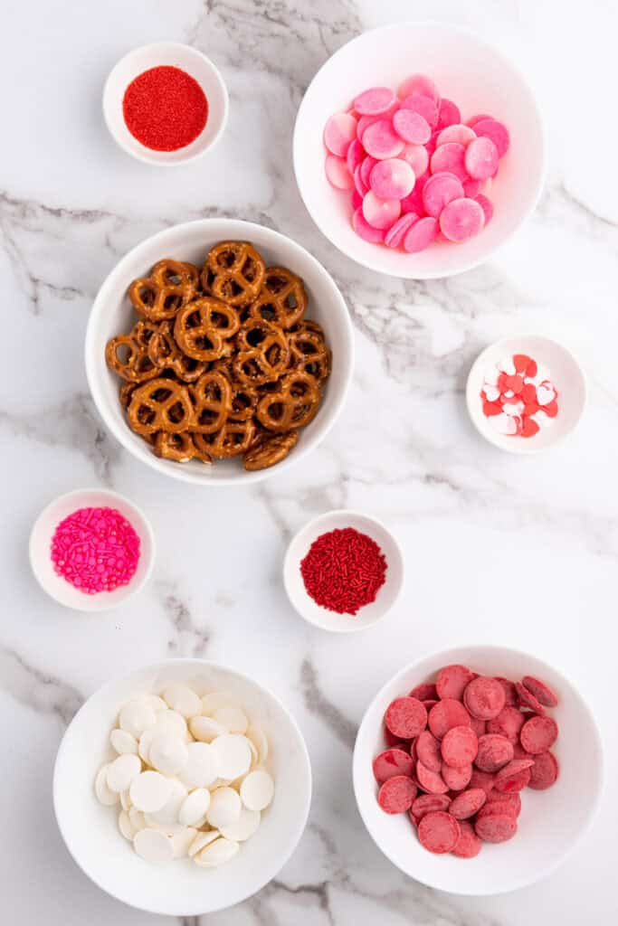 overhead shot of ingredients for valentine's day candy pretzels