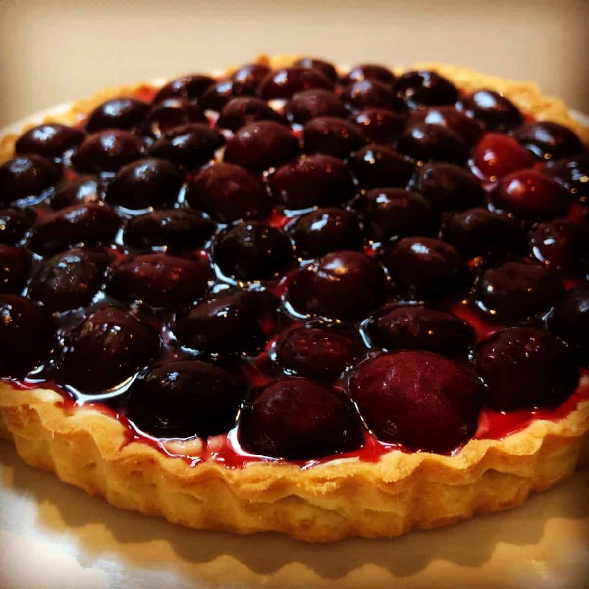 cherry tart on a cake palate