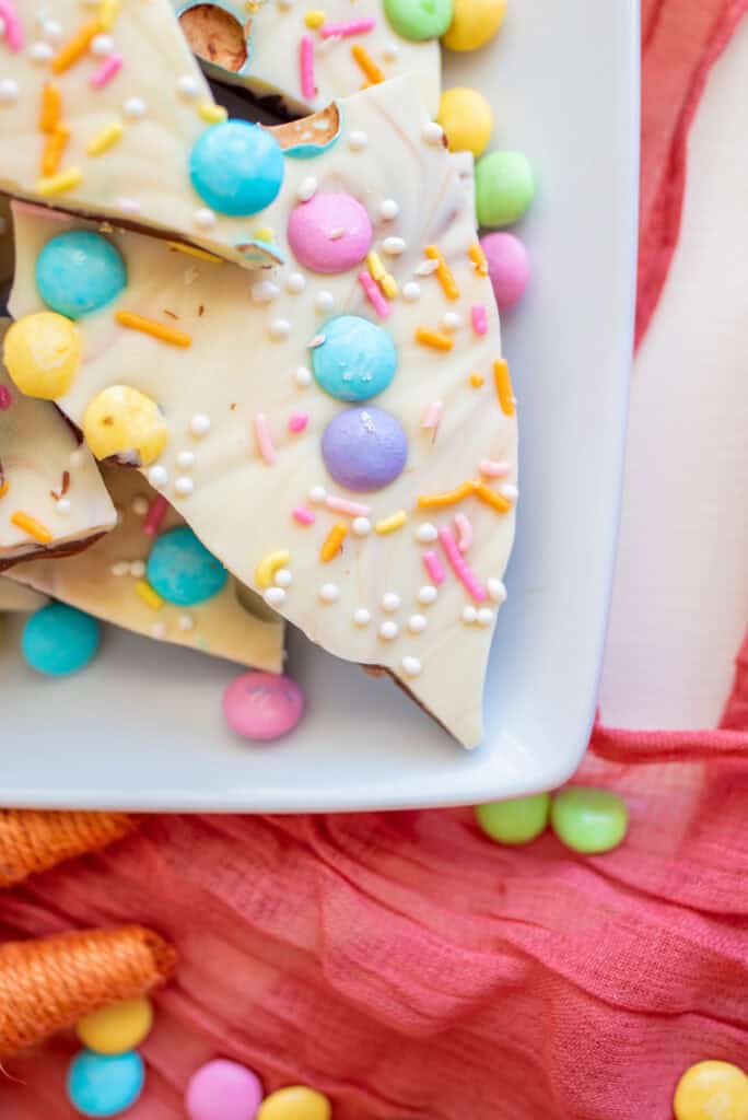 layered pastel chocolate bark on a plate