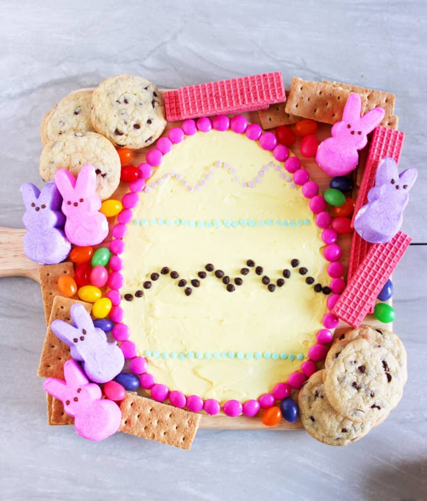 overhead shot of decorated frosting egg and treats