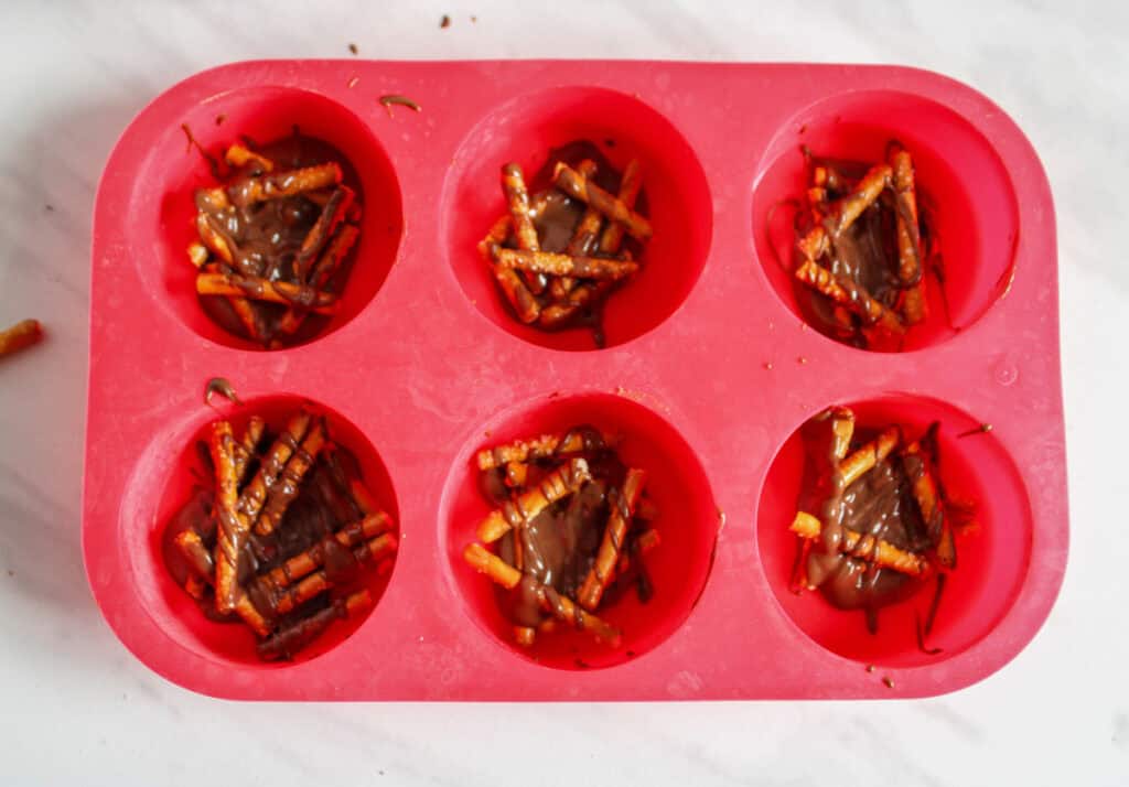 making the chocolate pretzel nests