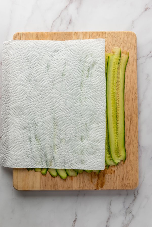 pat the cucumbers dry with paper towels