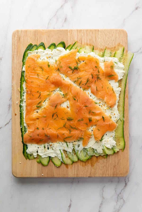 salmon and dill on top of the cream cheese layer