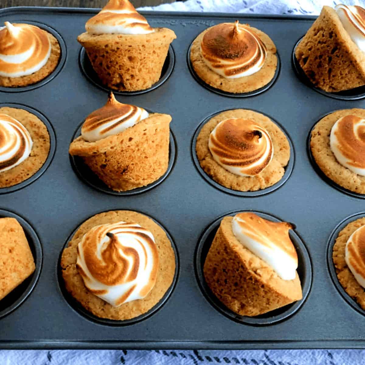 smore cups with meringue in a pan