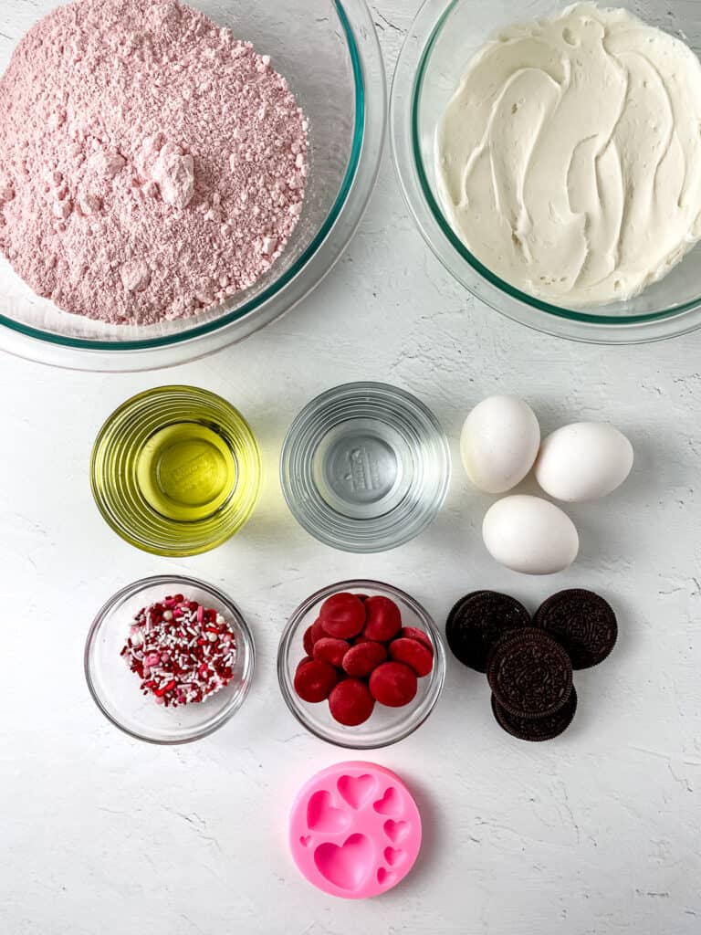 overhead shot of ingredients for strawberry cookies and cream cupcakes