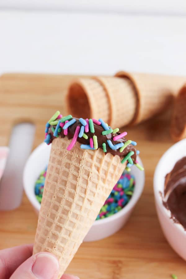 waffle cone dipped in chocolate and sprinkles