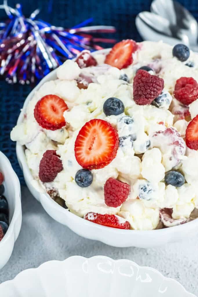 closeup of red white and blue cheesecake fluff in a bowl