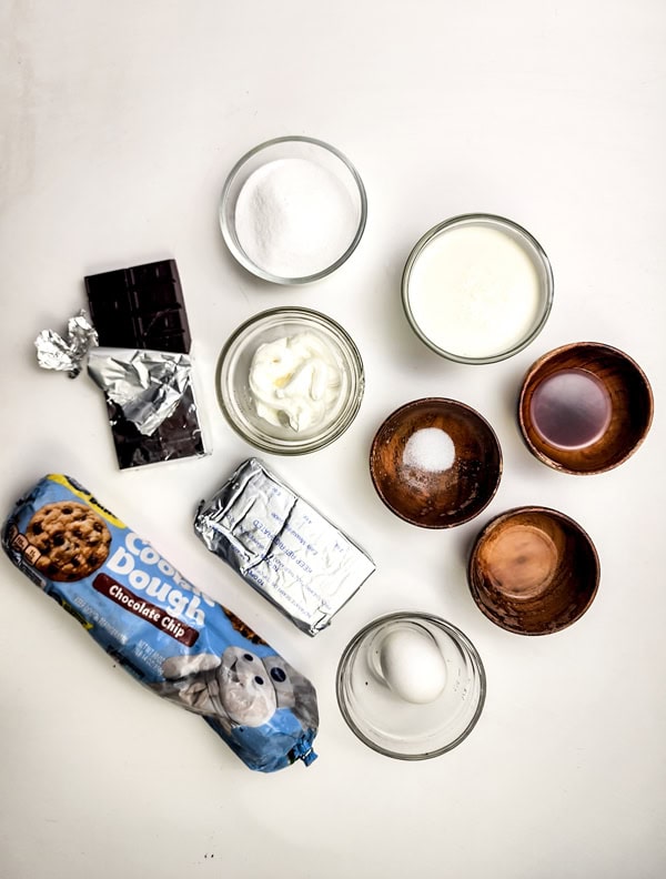 overhead shot of ingredients for chocolate chip cookie cheesecake bars