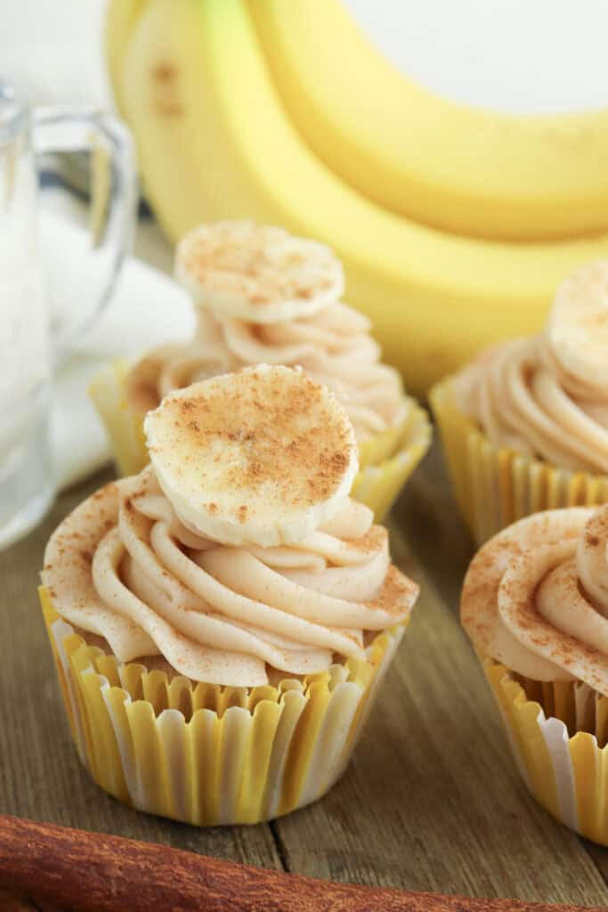 closeup of finished banana bread cupcakes after frosting