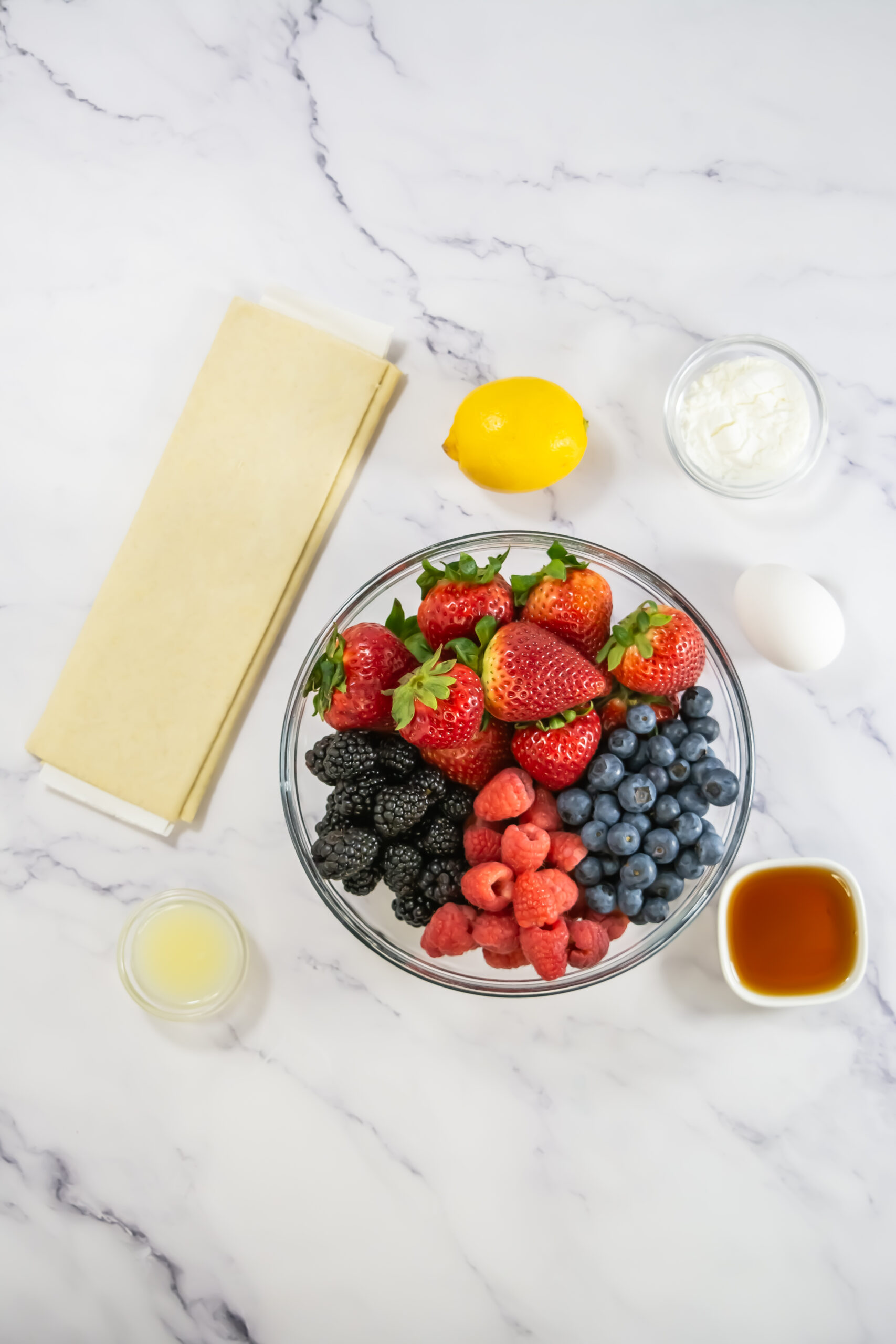 overhead shot of ingredients for mixed berry pastries