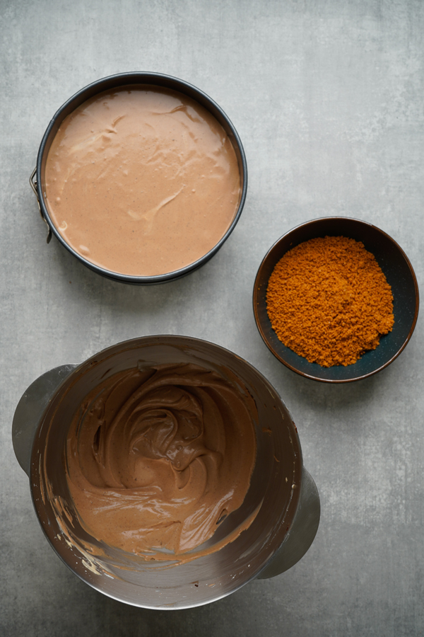 add one layer of cheesecake on top of crust