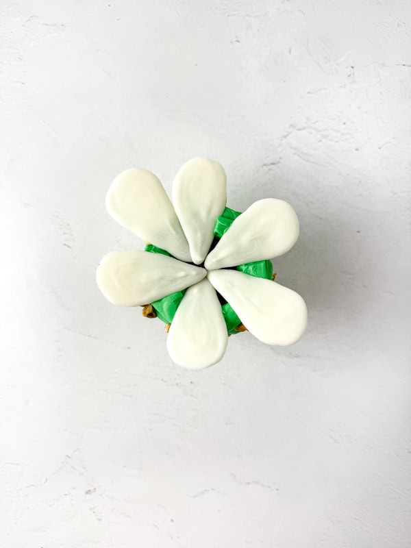 add the petals around the top of the cupcakes