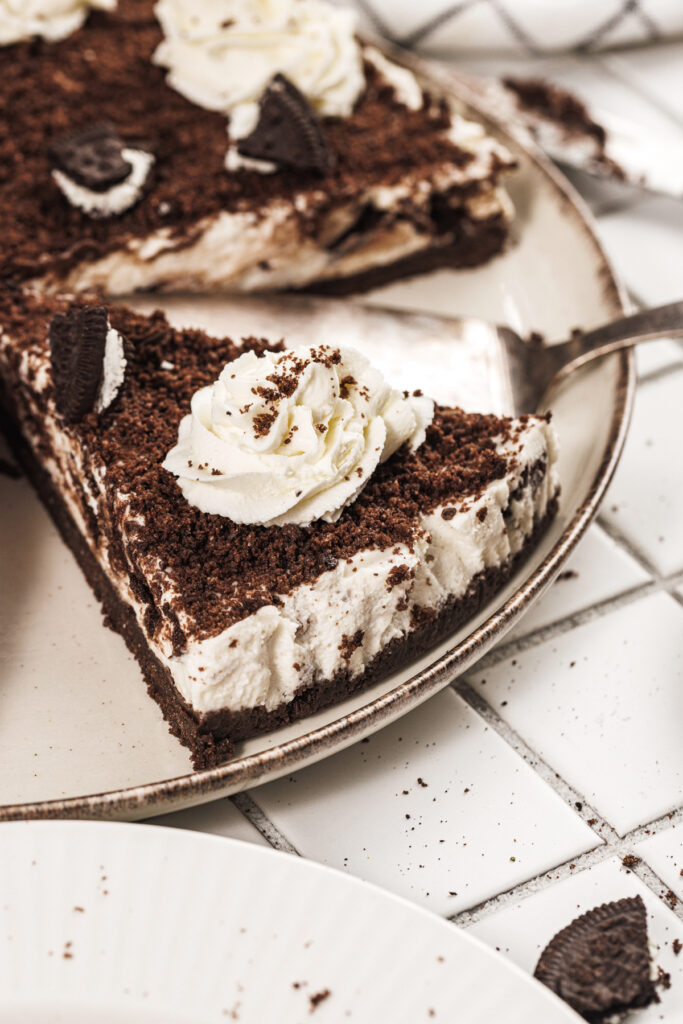 closeup of sliced Oreo cheesecake