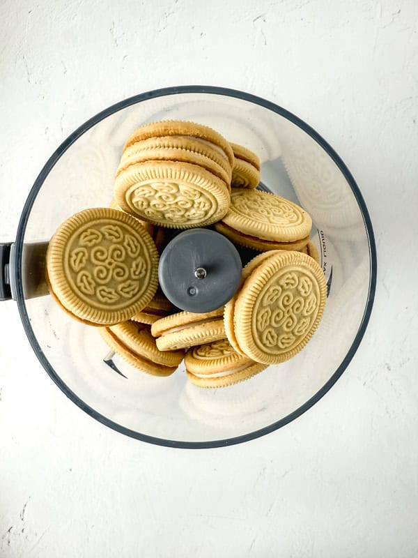 golden sandwich cookies in food processor