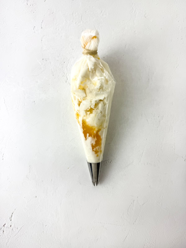 pineapple buttercream in piping bag