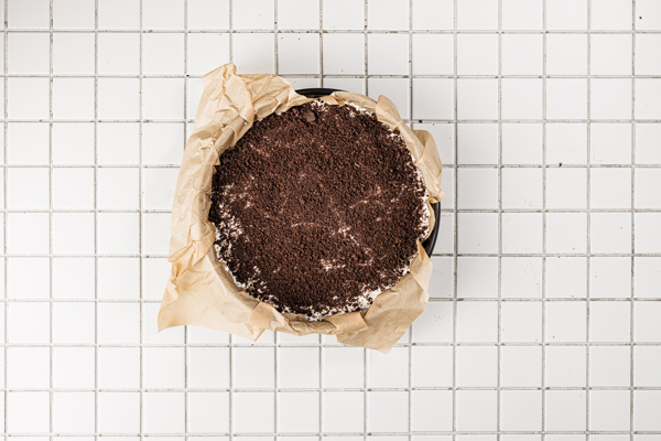 sprinkle crushed Oreos on top of the filling layer